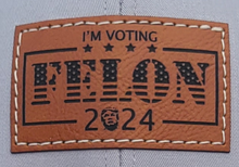 Load image into Gallery viewer, Trump Voting Felon 2024  Leather Patch Trucker Hat
