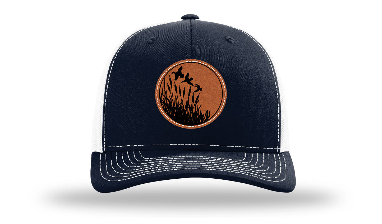 Ducks Fly Over Reeds Leather Patch Richardson 112 Hat-Navy / White