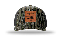 Load image into Gallery viewer, Kayaking Makes Me Wet Leather Patch Richardson 112PFP Camo Hat
